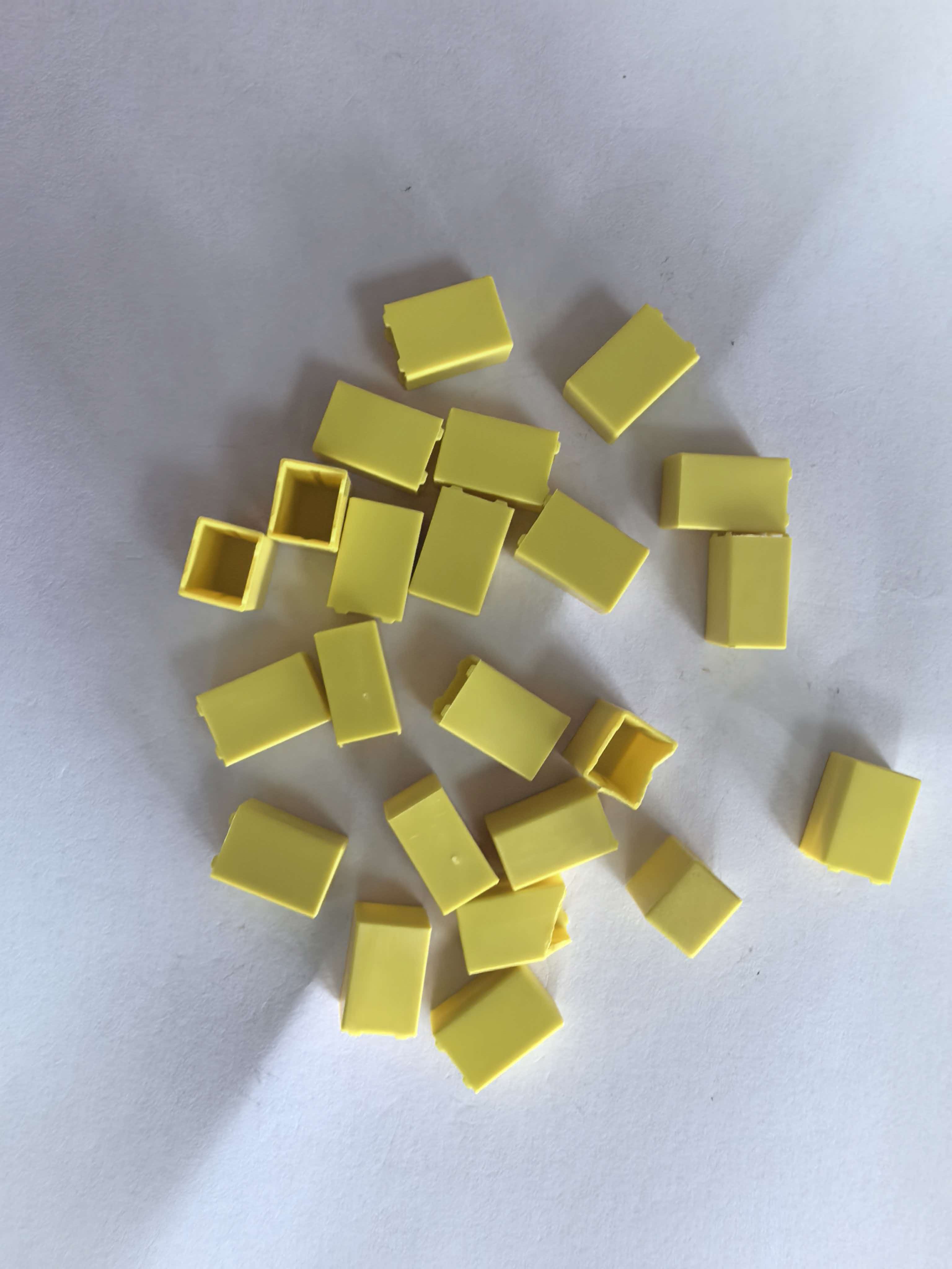 Yellow moulded plastic blocks for visual inspection